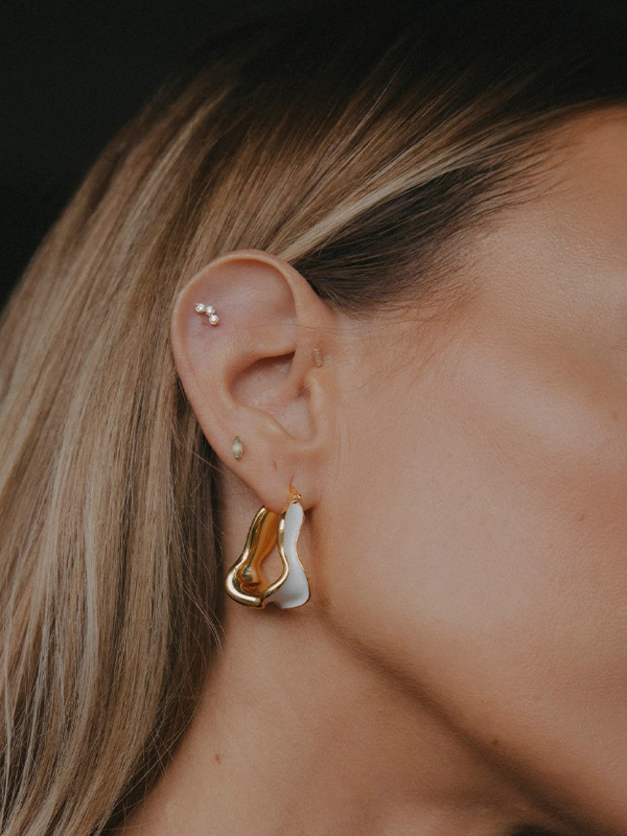 White detailed earrings